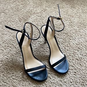 Stuart Weitzman size 6.5 high heel sandal.